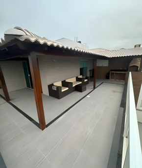 Cobertura duplex beira mar